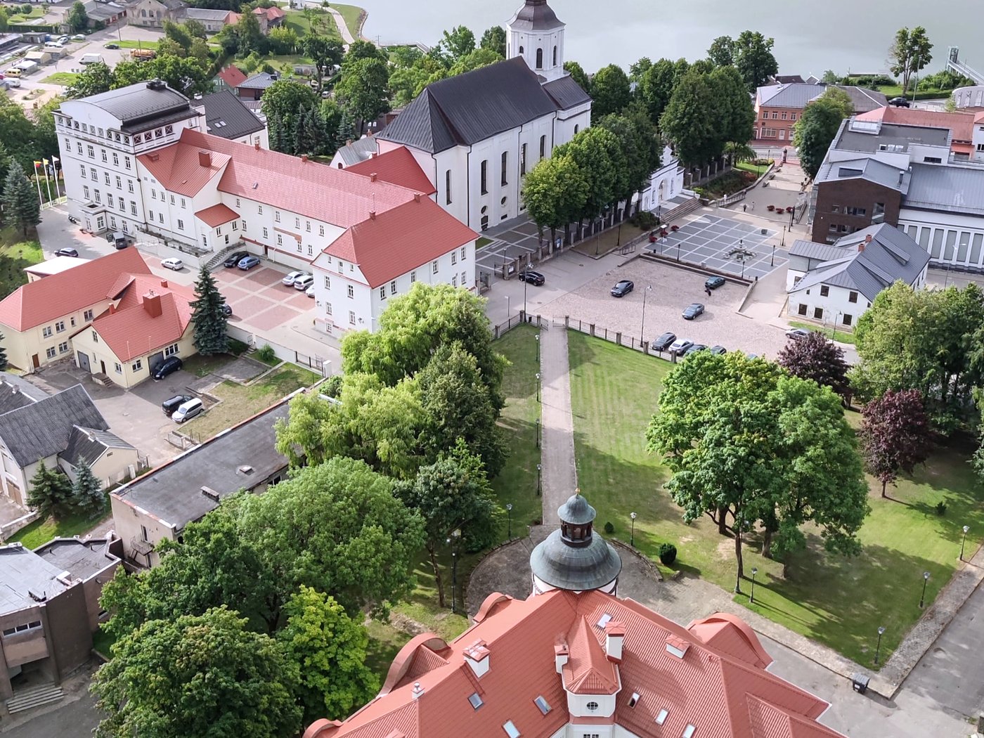 A bird's-eye view of the Telšiai old town: the church, the main square, and red rooftops